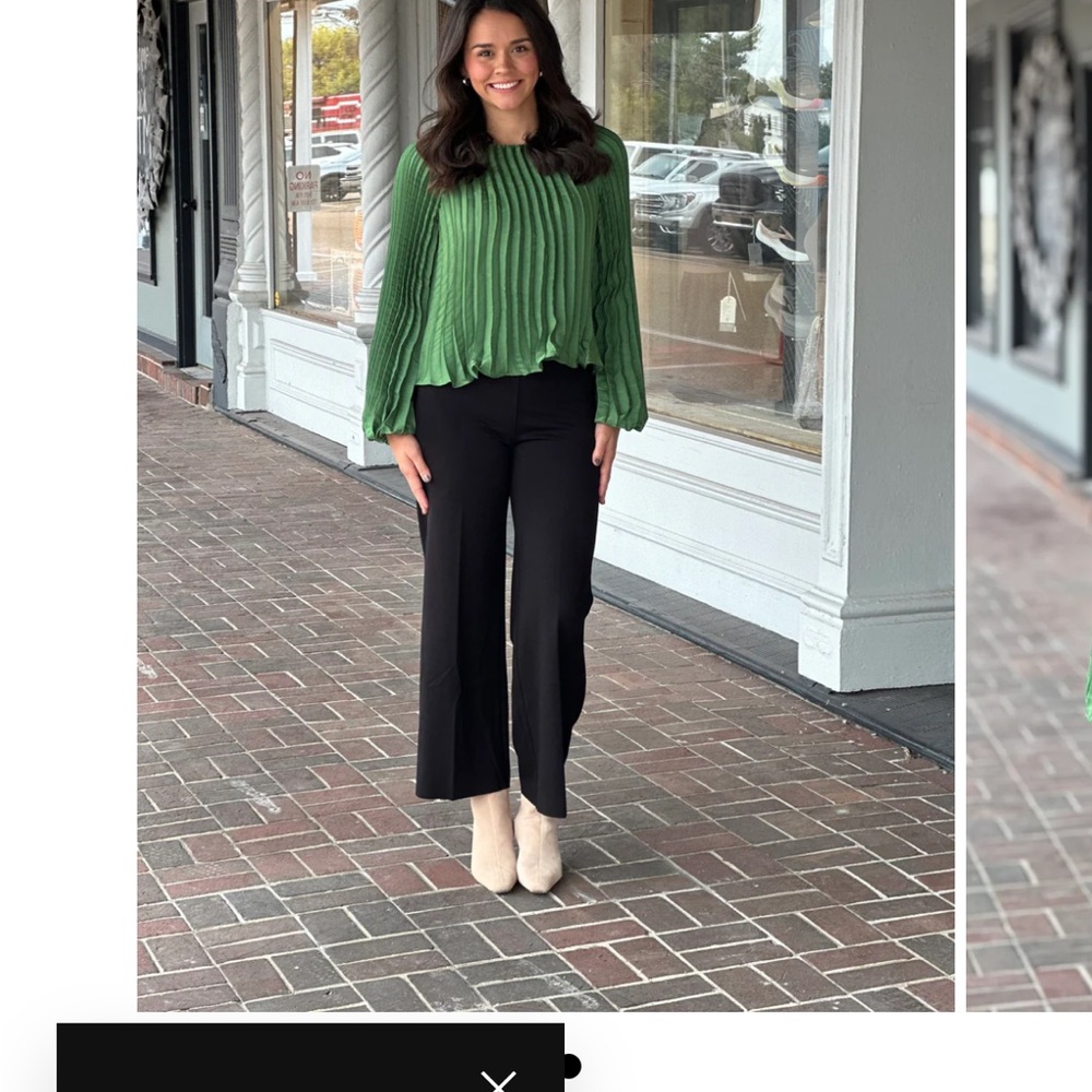 Green pleated blouse